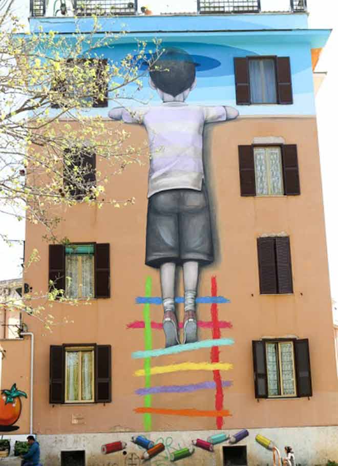 foto di street art bambino redentore