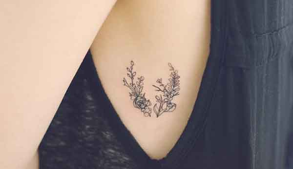 foto del tatuaggio coppia di fiori con i rami