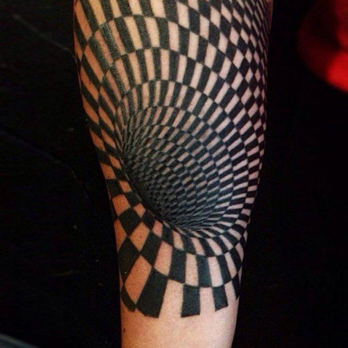 25 Tatuaggi che creano sorprendenti illusioni ottiche da farti girar la testa! articolo
