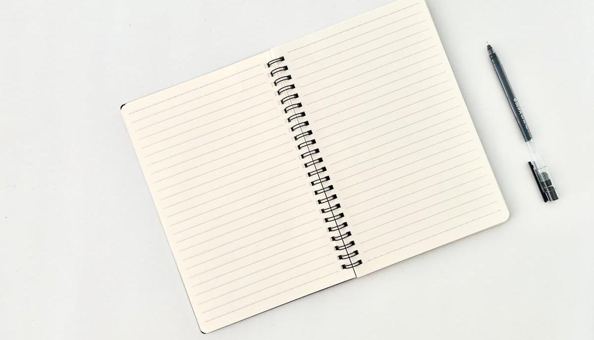 Quaderno e penna