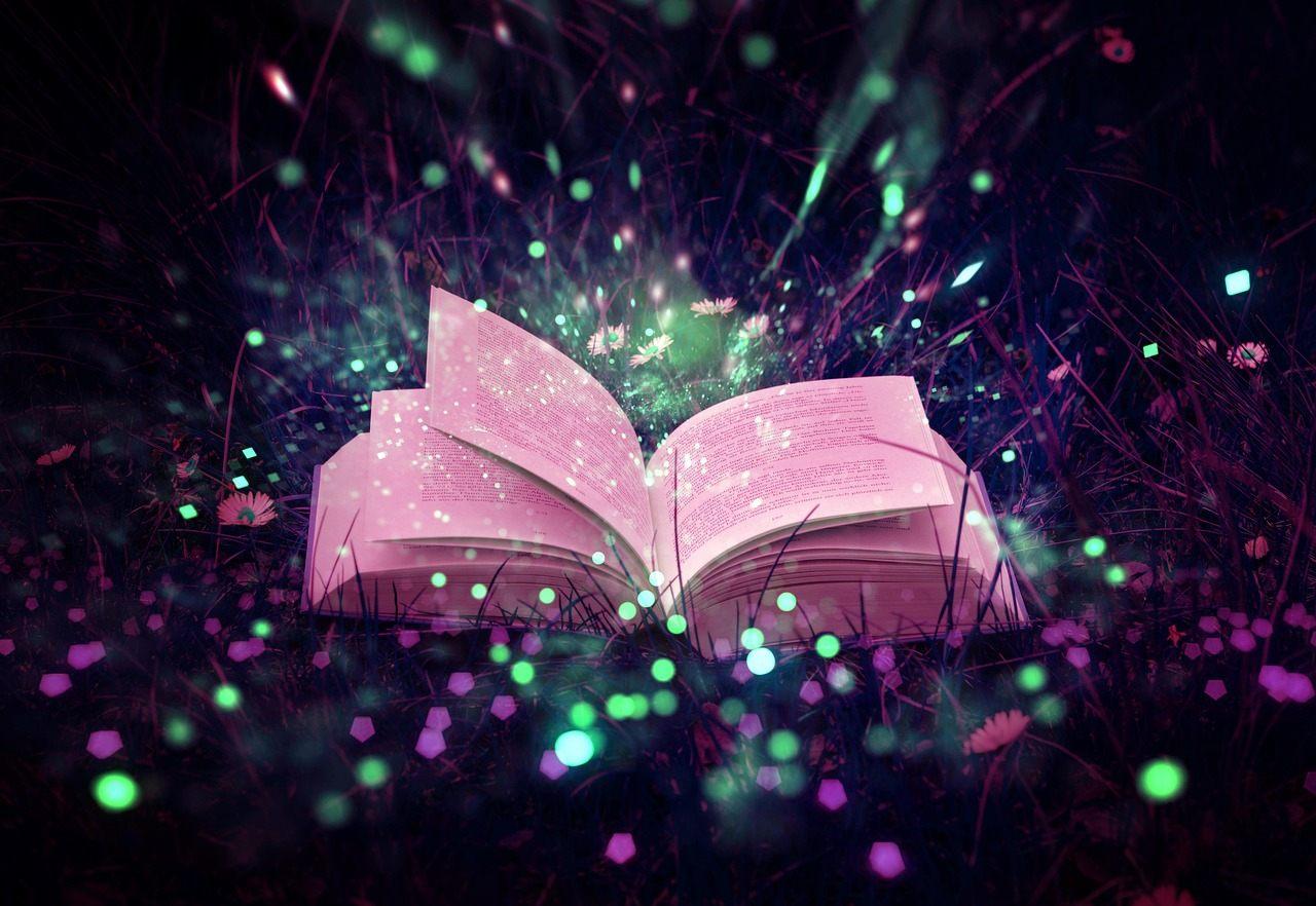 Libro di fiabe aperto con luce magica, il potere simbolico delle fiabe