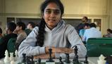 A soli 11 anni ottiene il titolo di Grande Maestro Femminile alle Olimpiadi di scacchi