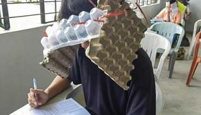 Vietato copiare all'Università: gli studenti indossano assurdi cappelli anti-sbirciata