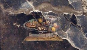 In un affresco di Pompei una pietanza che sembra pizza