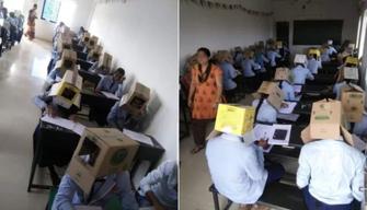 Scatole sulla testa durante l'esame per non far copiare